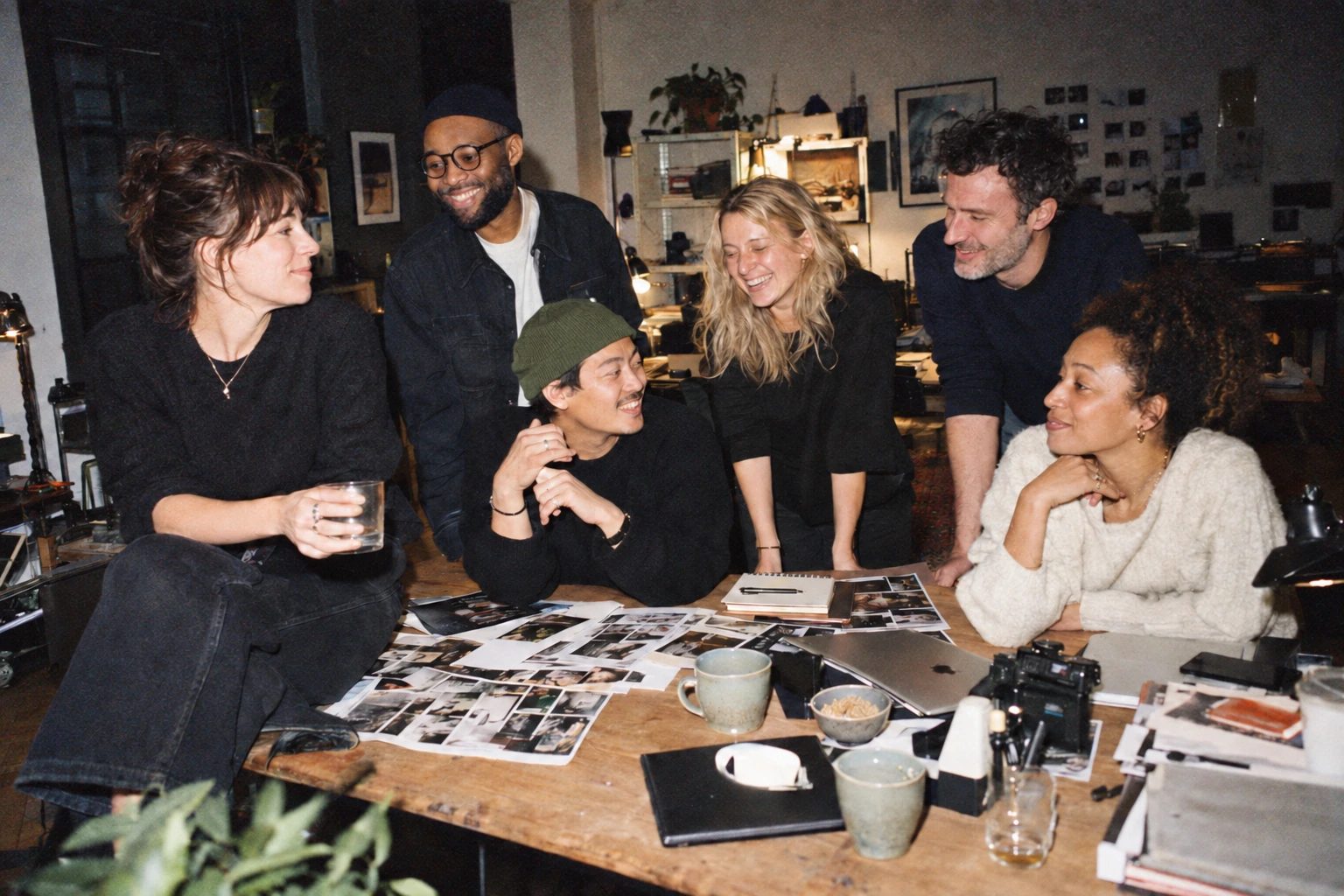 A candid studio scene with direct flash and film grain